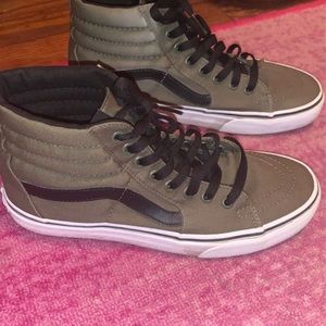 Green and black high top VANS